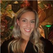 English teacher who helps others build confidence with the language